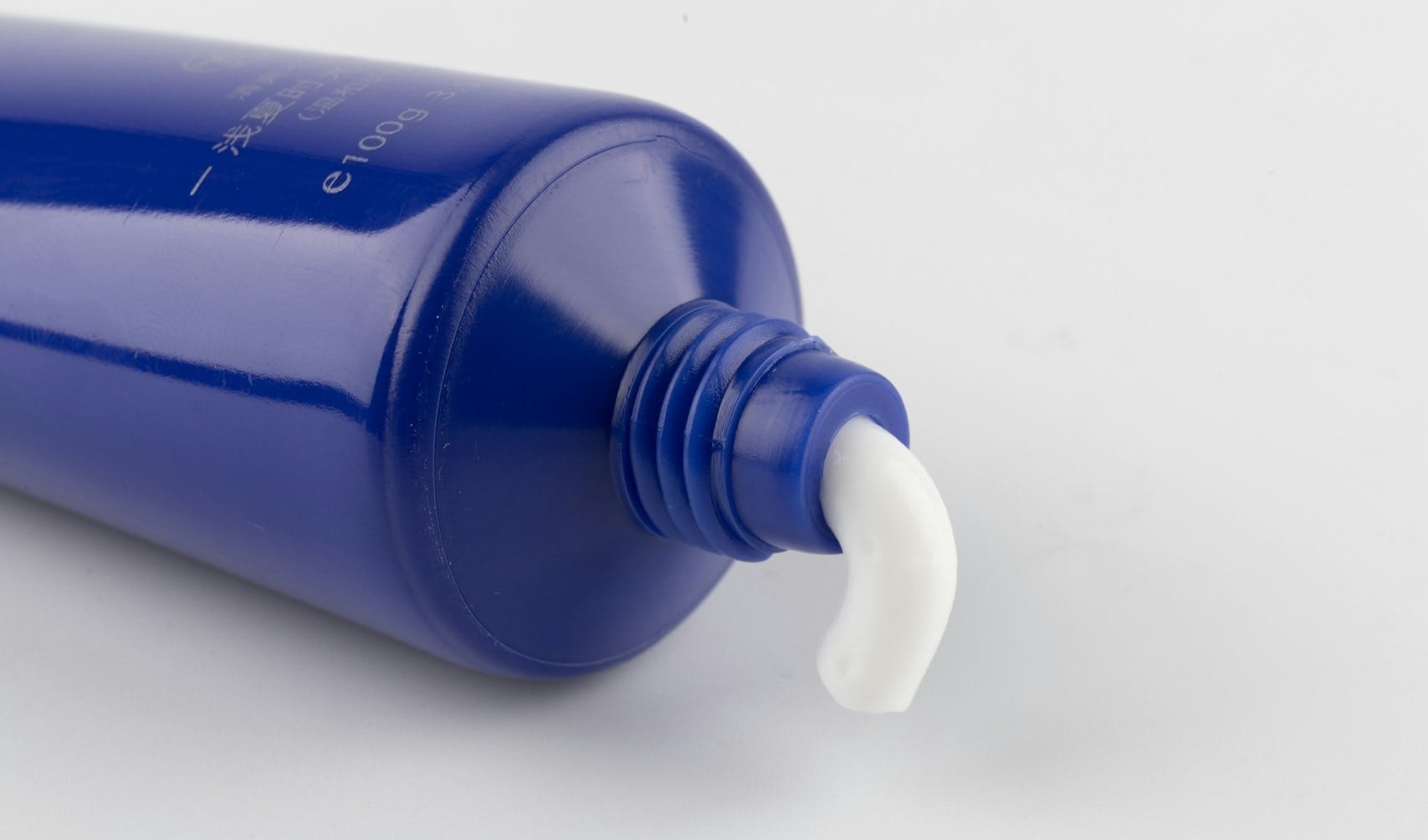 blue and white plastic bottle